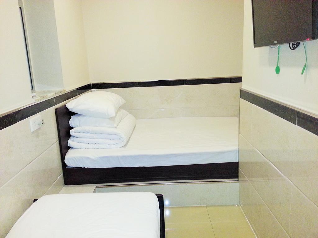 Grand Motel Kowloon Stadt Zimmer foto