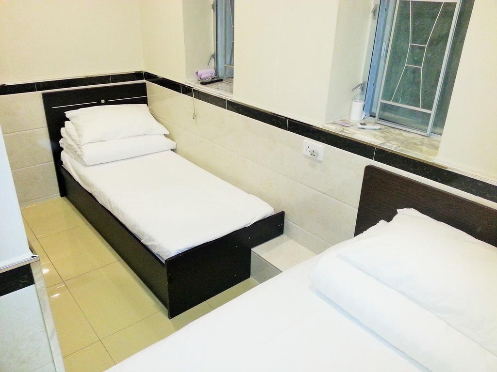 Grand Motel Kowloon Stadt Zimmer foto
