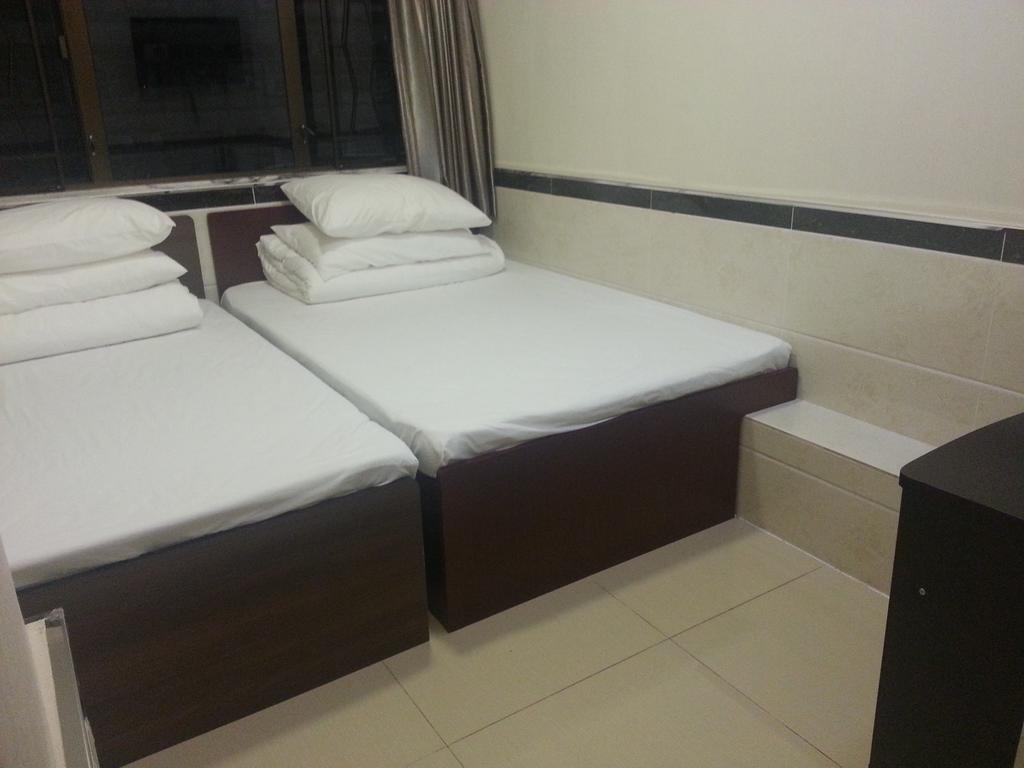 Grand Motel Kowloon Stadt Zimmer foto